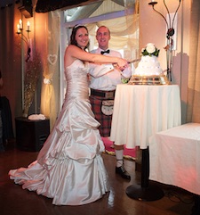 Dawn and Vincent cut the cake